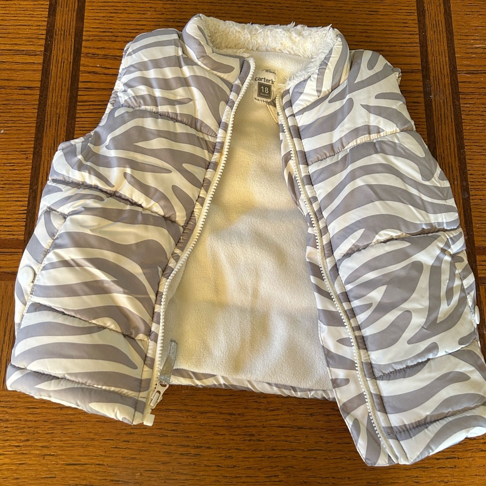 Carter's Zebra Print Puffer Vest in Gray and White. EUC, no stains, good zipper